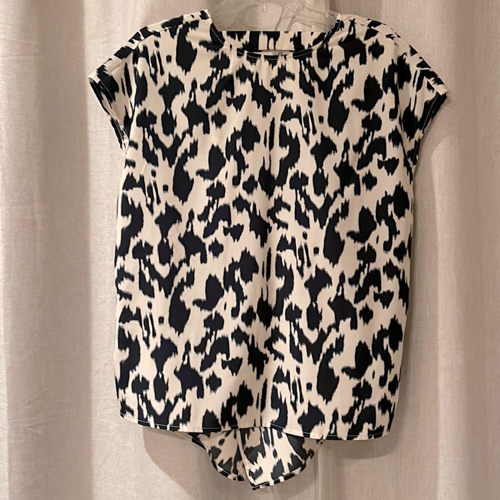 Green and cream blouse